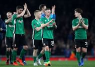 LONDON, ENGLAND - MARCH 11:  Lincoln City players applaud supporters after the full time whistle following defeat in The Emirates FA Cup Quarter-Final match between Arsenal and Lincoln City at Emirates Stadium on March 11, 2017 in London, England.  (Photo by Julian Finney/Getty Images)